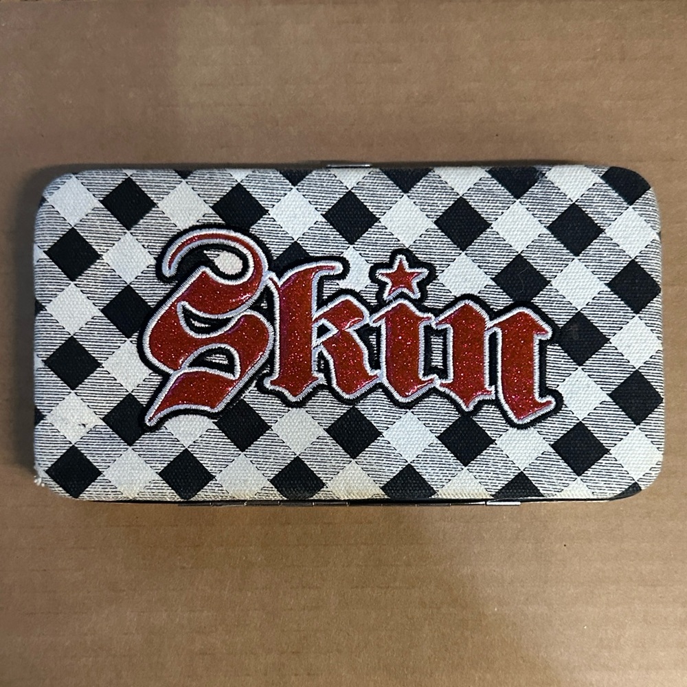 Skin Industries Checkered Black and White Wallet with Red 'Skin' Logo